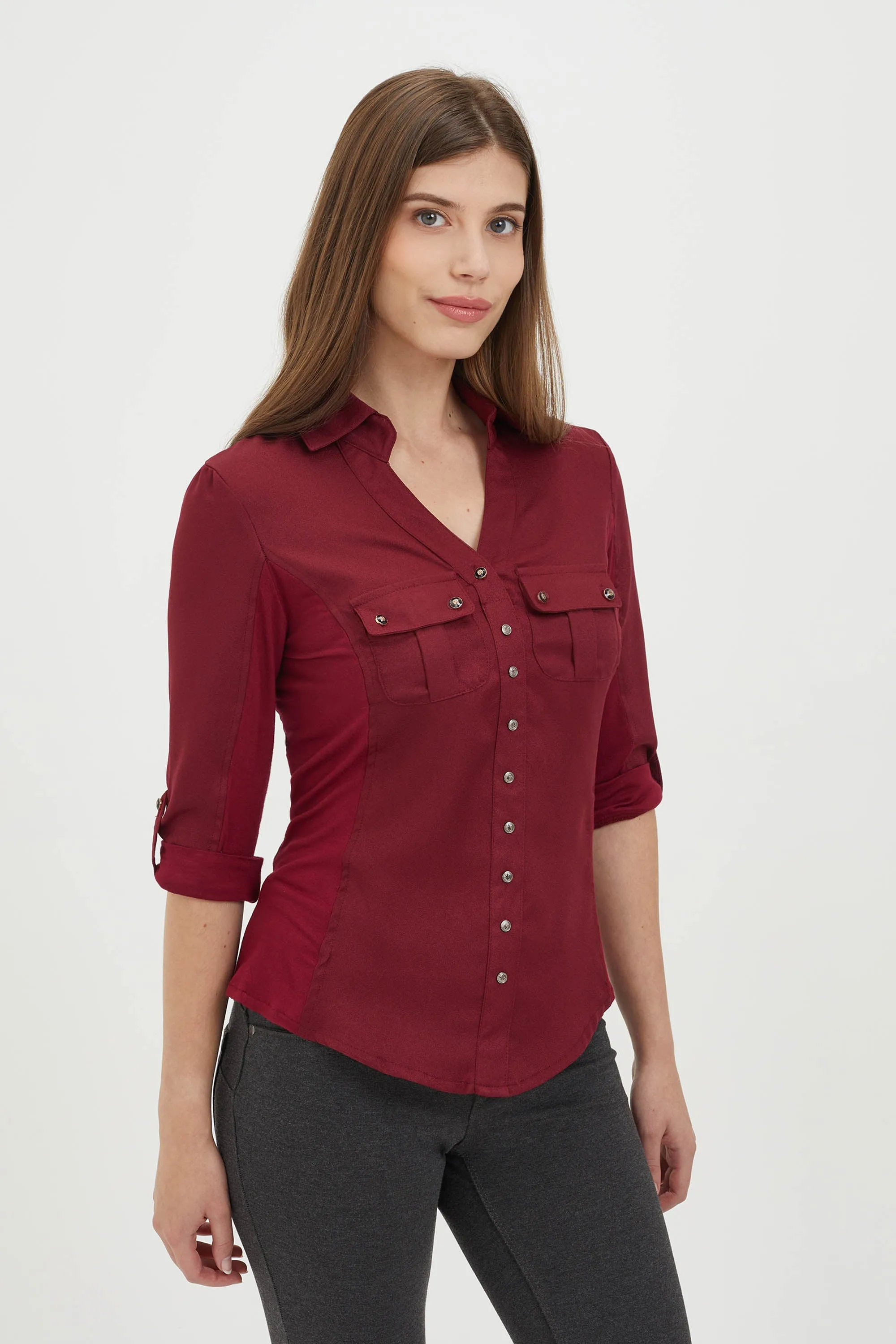 Fitted blouse with pockets